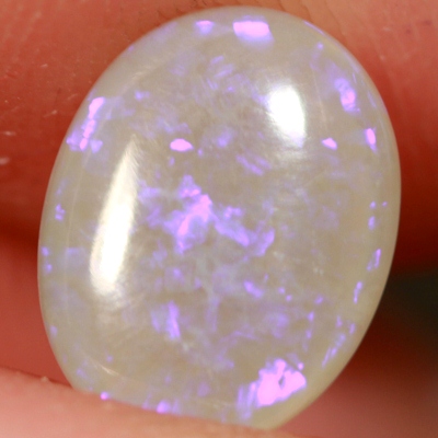 SOLID CRYSTAL OPAL Translucent with rich purple sparkles